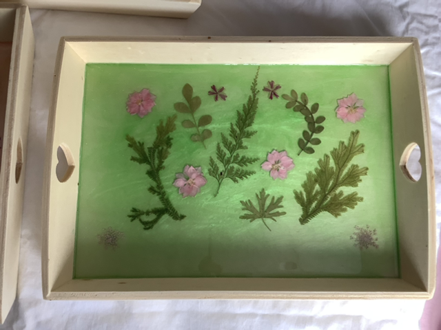 Set of three wooden trays
