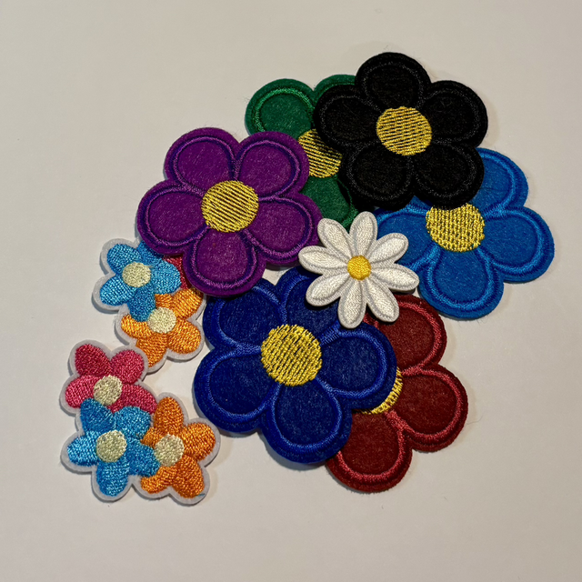 C- 9 mixed flower iron/sew on flowers