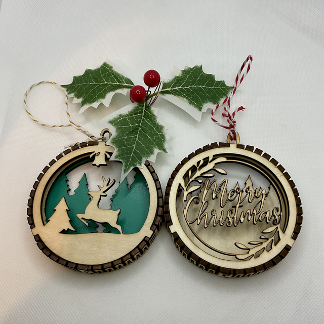 Laser cut Christmas ornament. Wooden design.