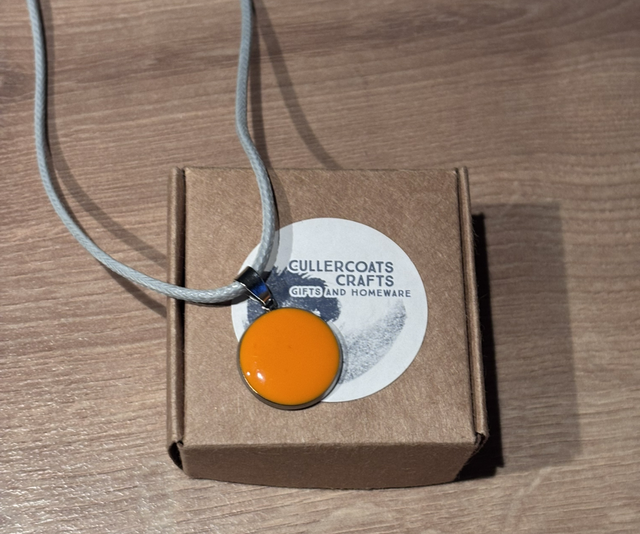 Orange resin charm necklace 