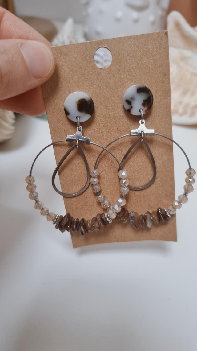 Boucles d'oreilles đ
