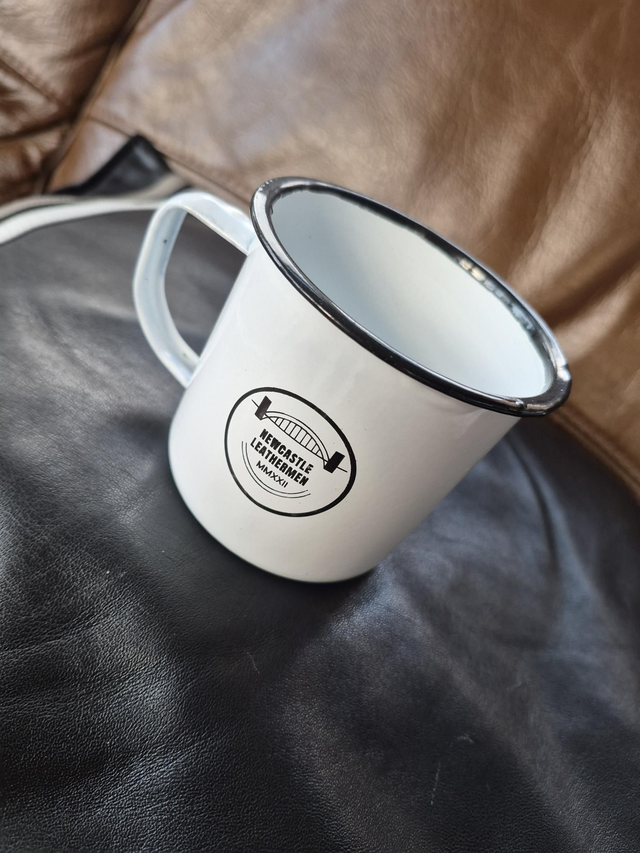 Tin mug with NLM logo 