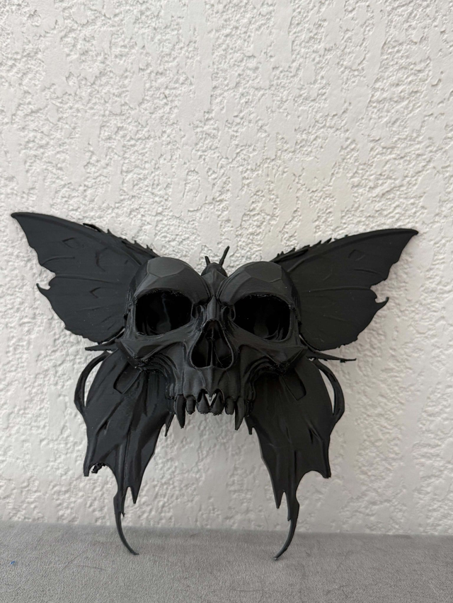 Papillon tête de mort mural