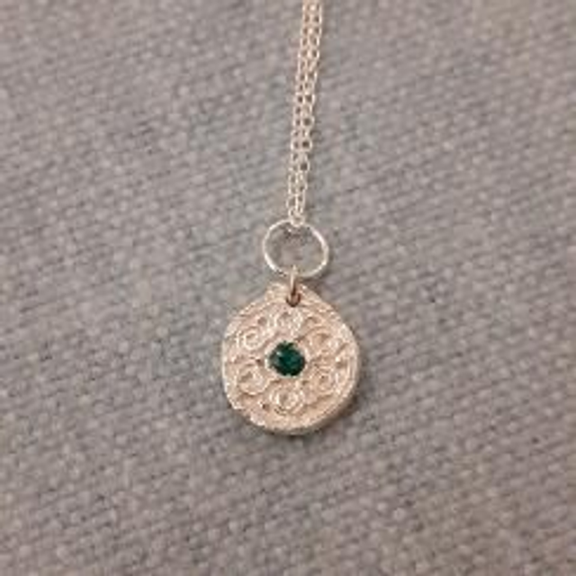 Spiral  emerald  pendant
