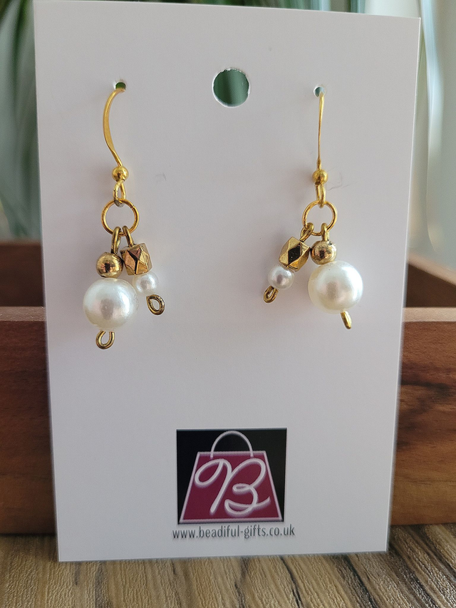 Drop earrings with white and gold theme