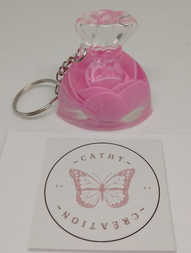 Bijoux de sac avec inclusion d' une rose artificielle 
