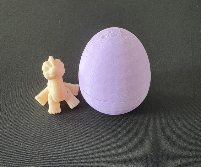 Purple mystery egg hidden articulated animal in side 