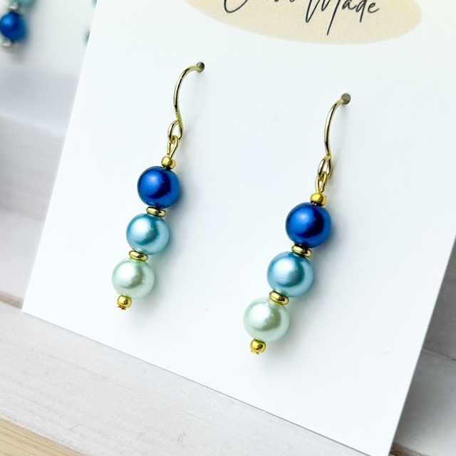 Glass pearl dangle earrings blue and gold 