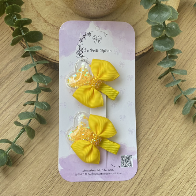 Paire de barrettes cœur pailletée 