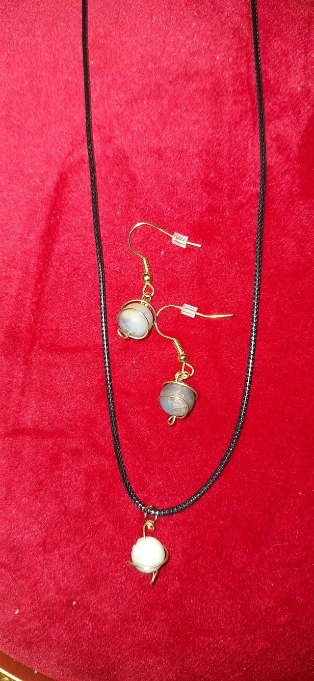 Planetary lovers set in gold with matte amazonite