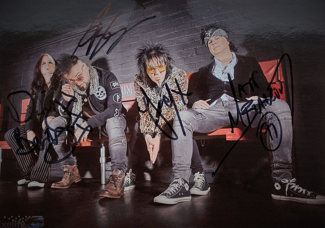 Band Photo 02 - Officially Signed