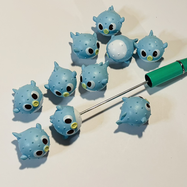 J- 4 very nice Puffa Fish figures