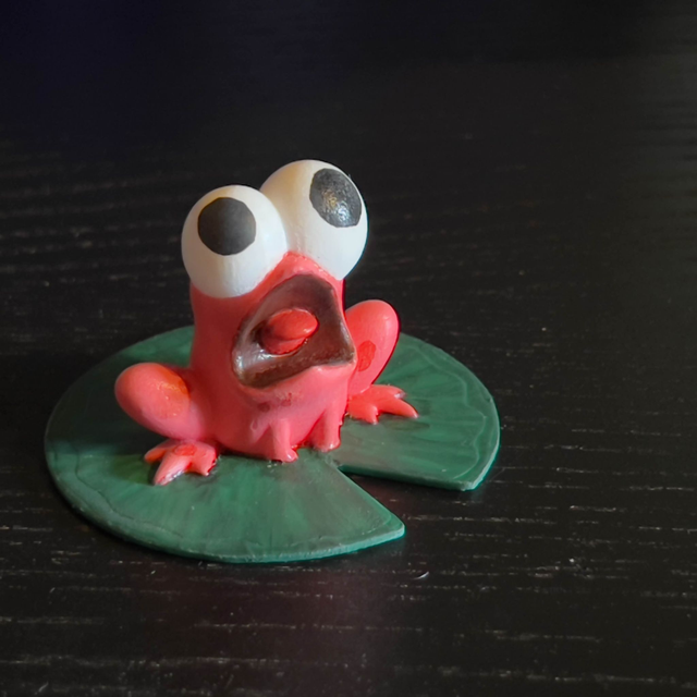 Grenouille paniquée rose