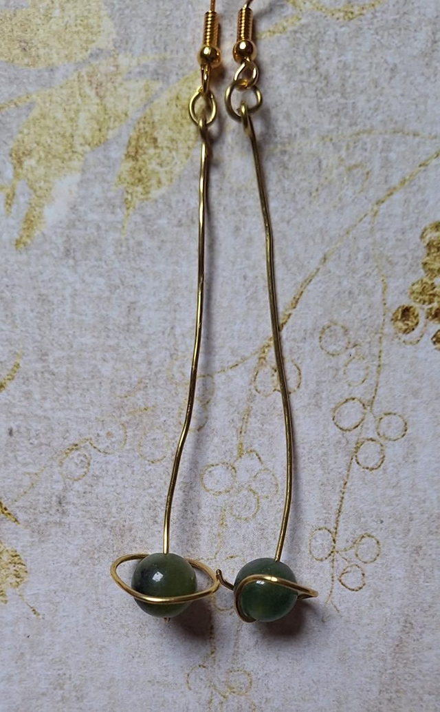 Saturns love in gold with green jade, two earrings