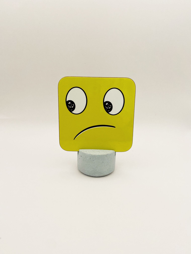 Sad face coaster