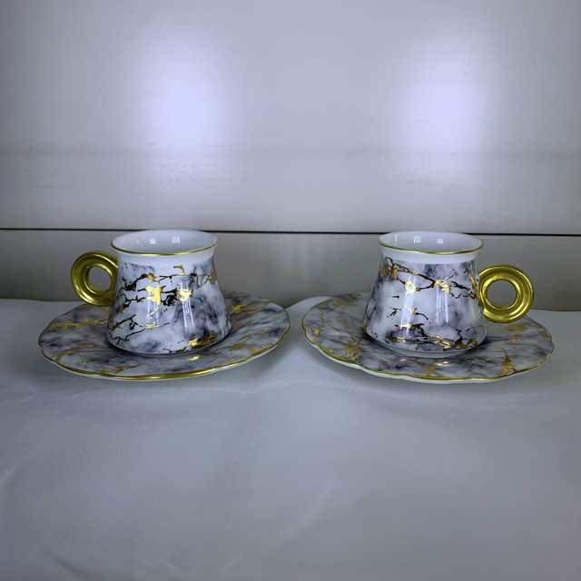 Service à café marbré- dorée blanc 