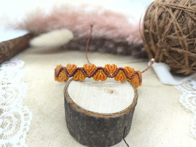 Bracelet tissage coeurs orange/cuivré 