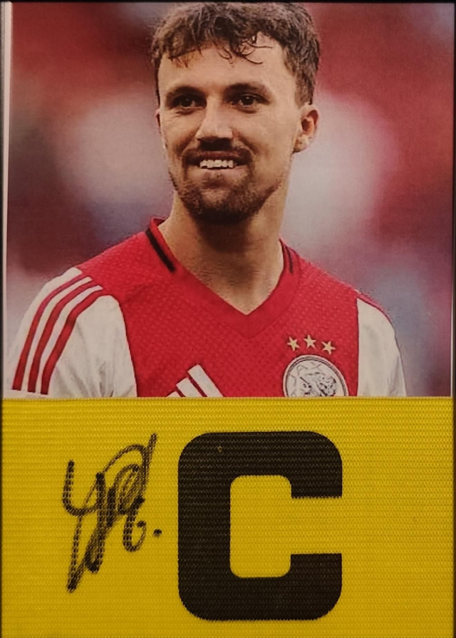 Gesigneerde aanvoerdersband van Regeer