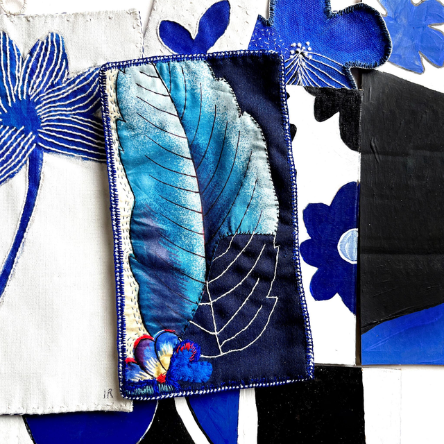 Broderie sur tissu vintage bleu à motif végétal