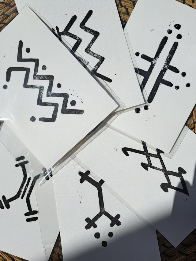 Symbole TIGMI - Linogravures