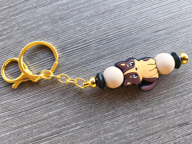 Porte clef doré chat