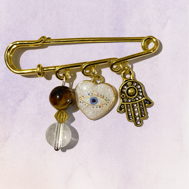 Broche porte bonheur et protection 