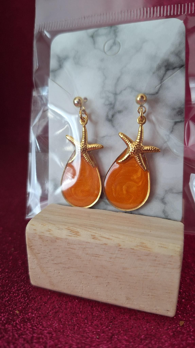 Boucles d&#039;oreilles Étoiles dorées / orange 