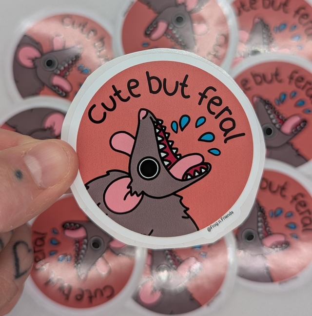 Cute but feral sticker 
