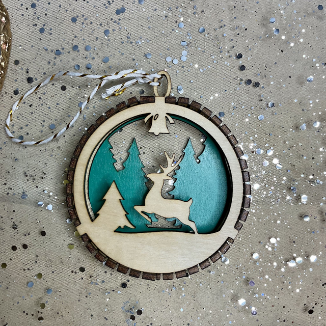 Laser cut Christmas ornament. Wooden design.