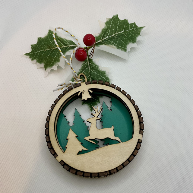 Laser cut Christmas ornament. Wooden .