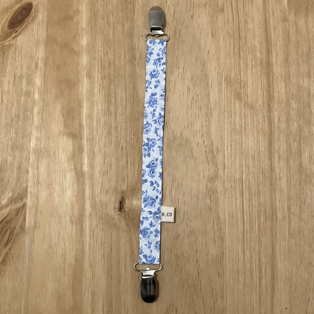 Attache doudou fleur bleu