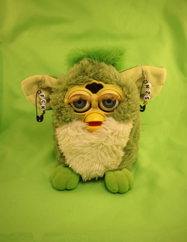 Paire boucle d'oreilles "fck nzs" 