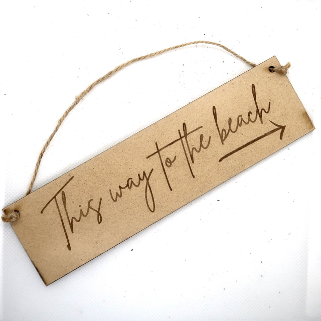 'This way to the beach' - Sign