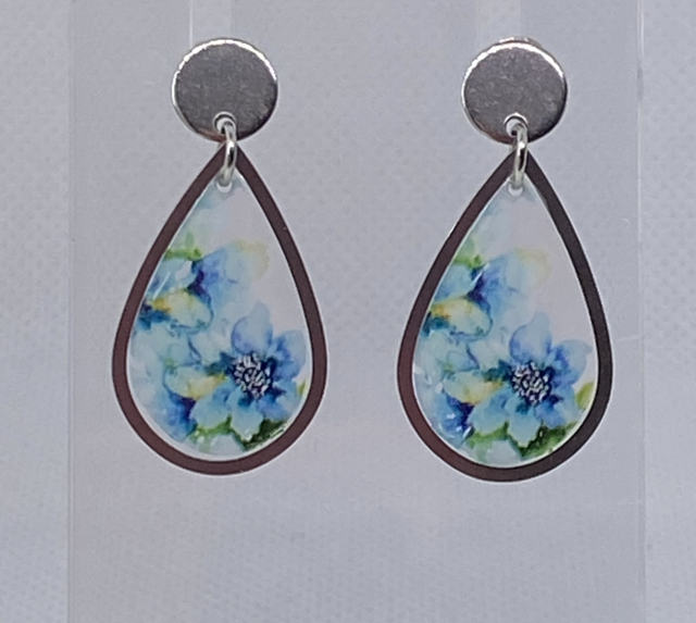 Silver earrings with flower transfer 