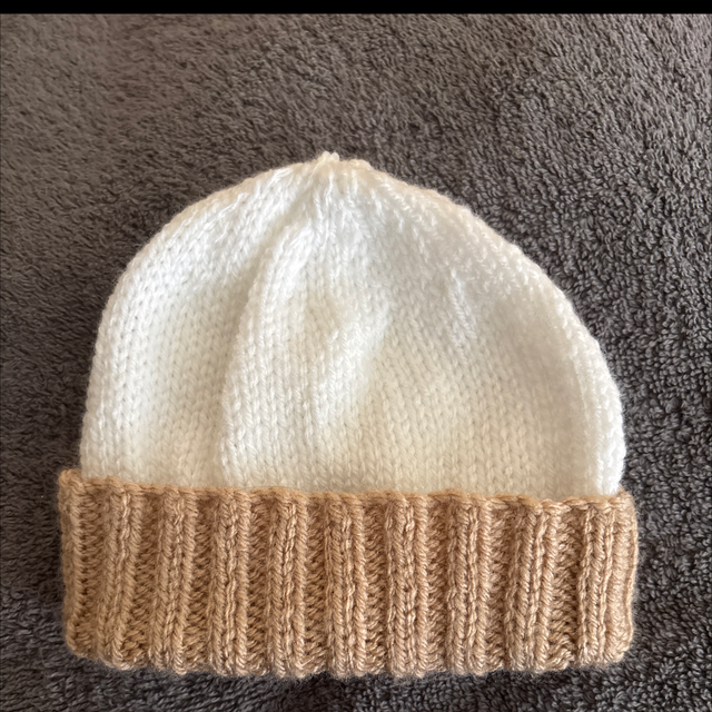 White and beige baby hat