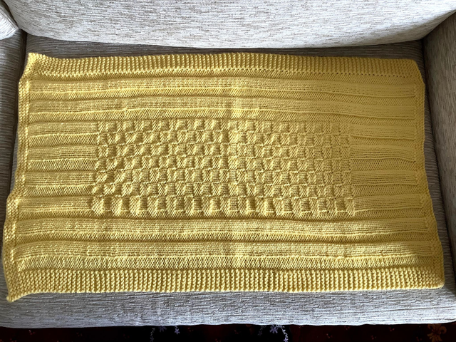 Hand Knitted Blanket in Lemon Baby soft Chunky yarn with basket weave and rib pattern