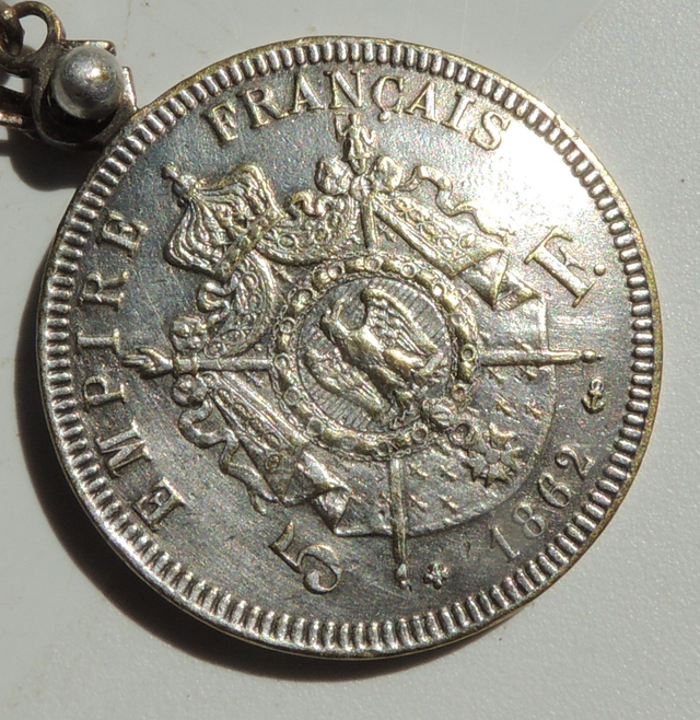 Porte-clés publicitaire ancien Orangina