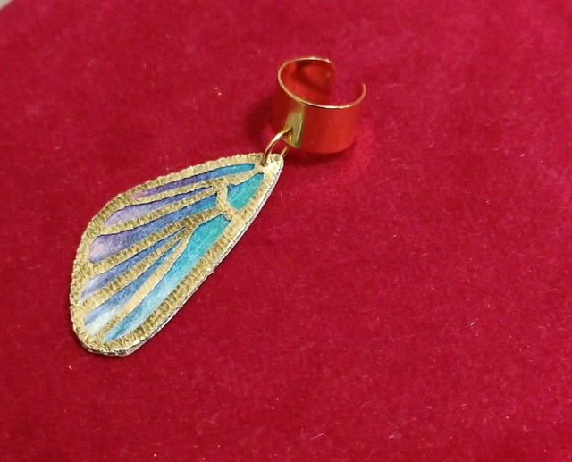 Bague d'oreille aile de papillon textile