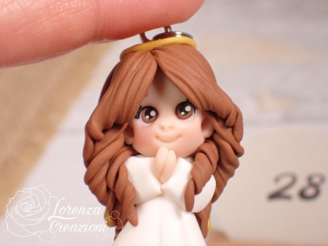 Angioletto custode tascabile n.
28 Portachiavi o charm, artigianale, pezzo unico. Modellato a mano argilla polimerica, made in Italy.