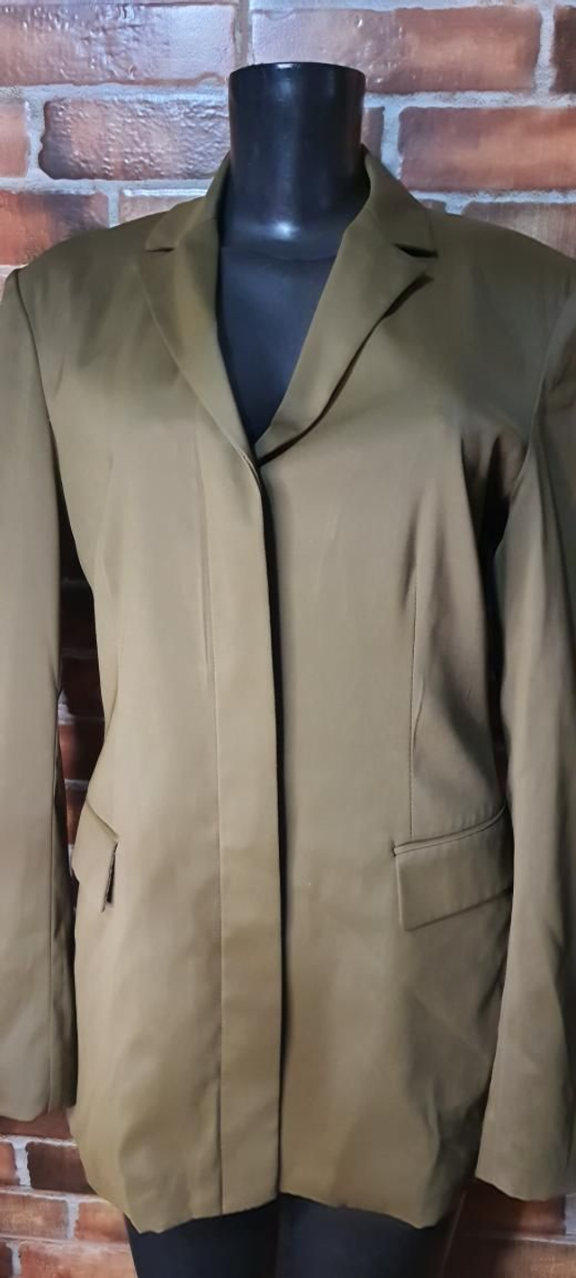 Terninho FEM. MARROM, T/M. OBS: USADO SUPER CONSERVADO 