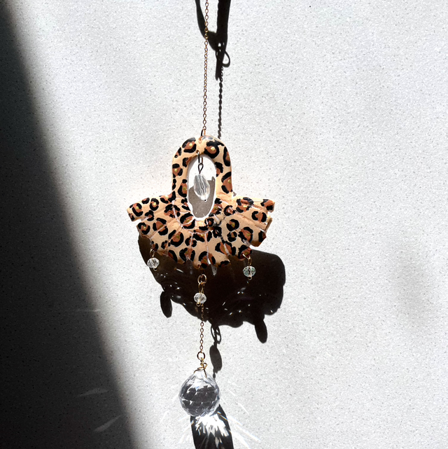 Attrape soleil léopard 