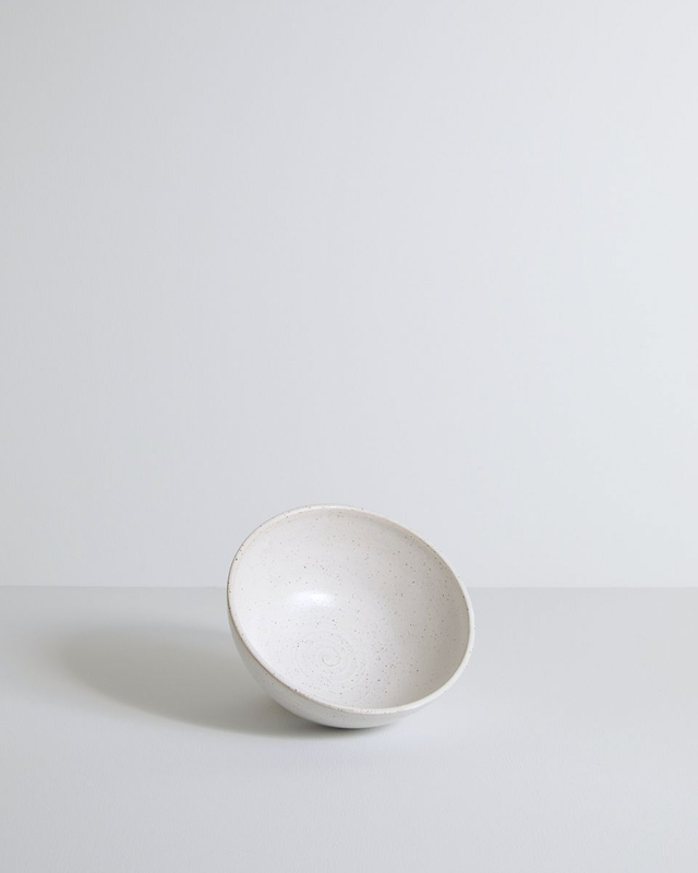 Small white speckled bowl