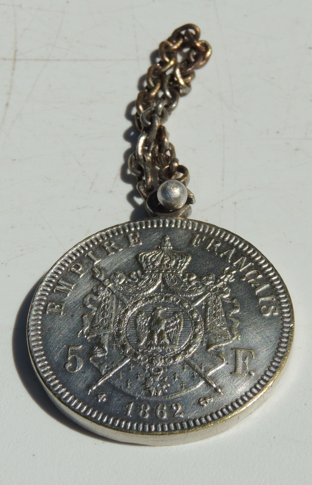 Porte-clés publicitaire ancien Orangina