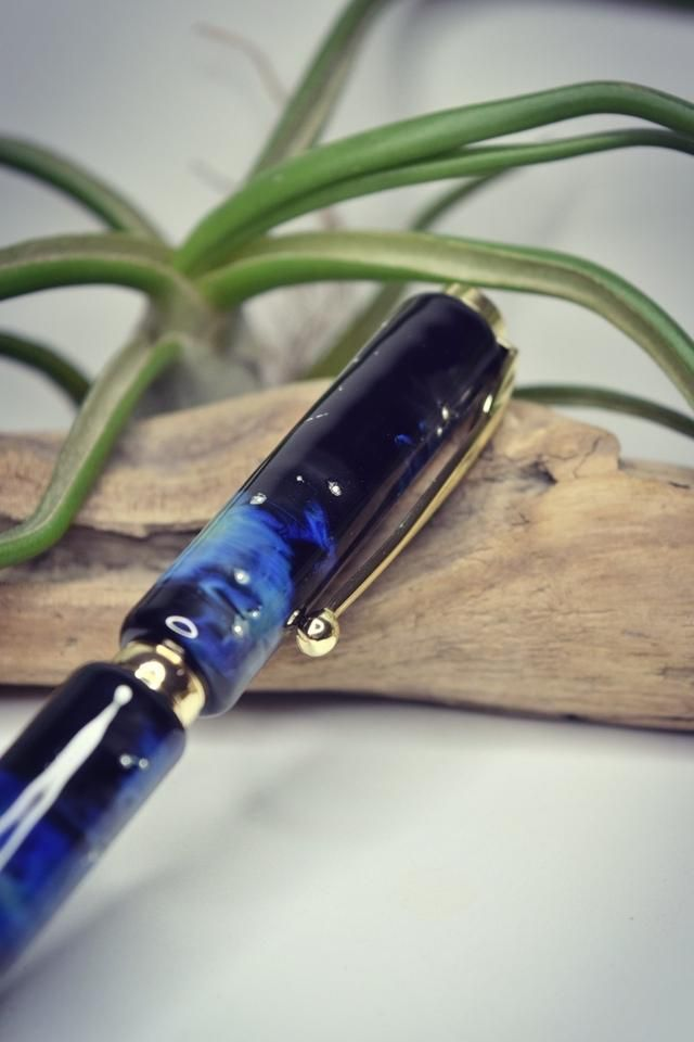 STYLO A BILLE FIL D'ARGENT MONTURE OR 