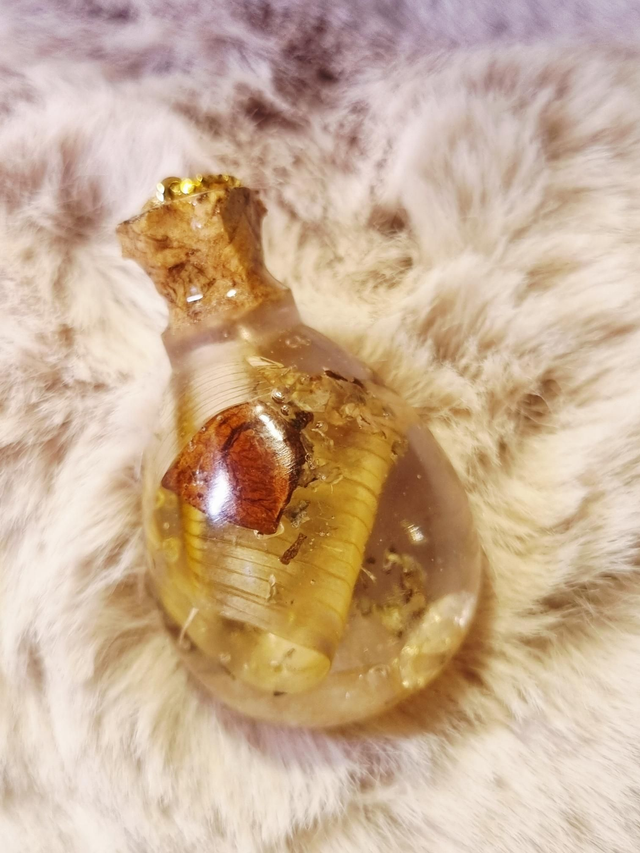 Le Pendentif Potion #55 - Joie