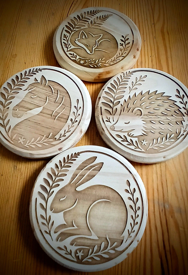 Coasters forest set of four.