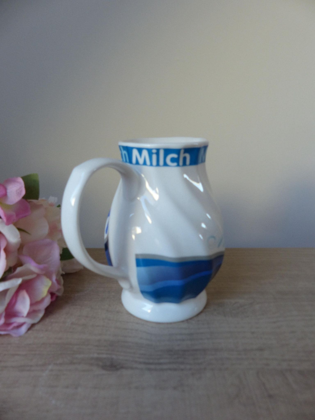 Pot à lait vintage Solecasa - Porcelaine bleue et blanche décor vaches, charme champêtre pour petit déjeuner en famille ou déco florale