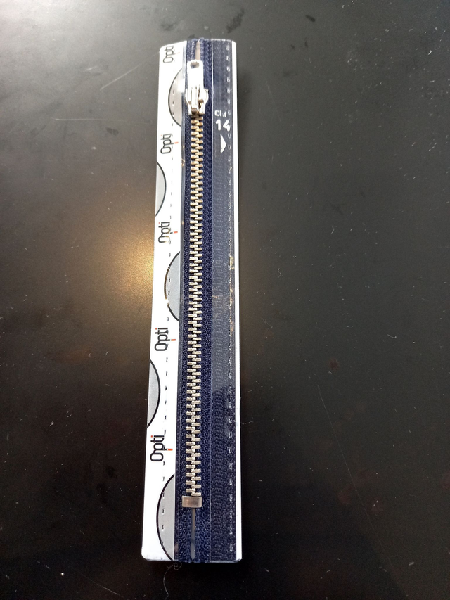 M40 / kleur 210 Opti Rits metaal (zilver)