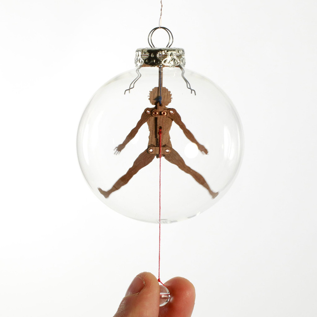 Mechanik im Glas "Vitruvianischer Mensch", D 80 mm