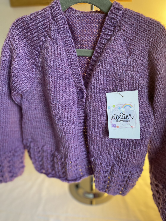 G5. Girls knitted cardigan. 26 inch chest